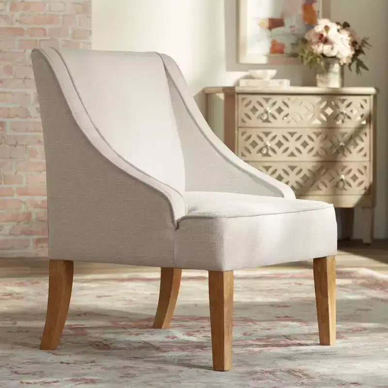 Poltrona Elm Lane Dixon Ivory in tessuto con braccioli a sbalzo